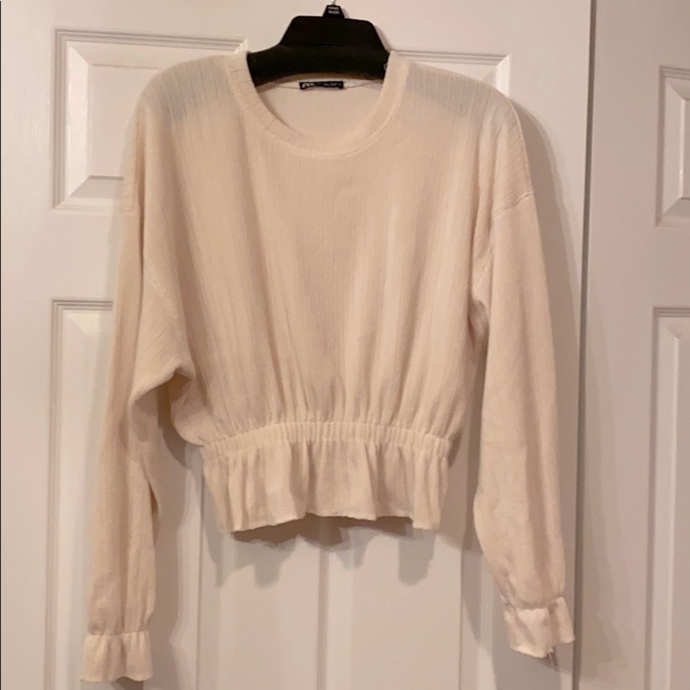 Cream colored sweater from Zara